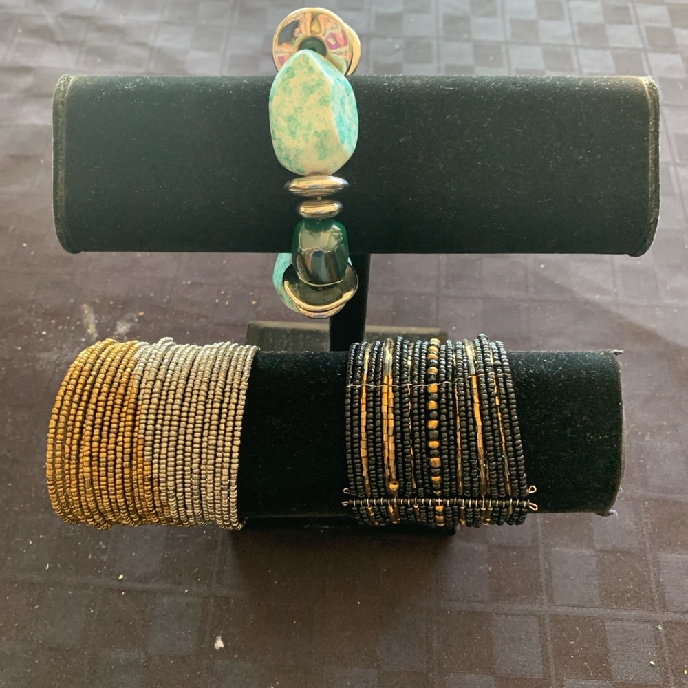 Turquoise and silver stretch , gold and black cuff and silver and gold cuff